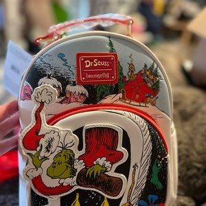 Loungefly grinch back pack and wallet. Sold as a set. Brand new with tags!